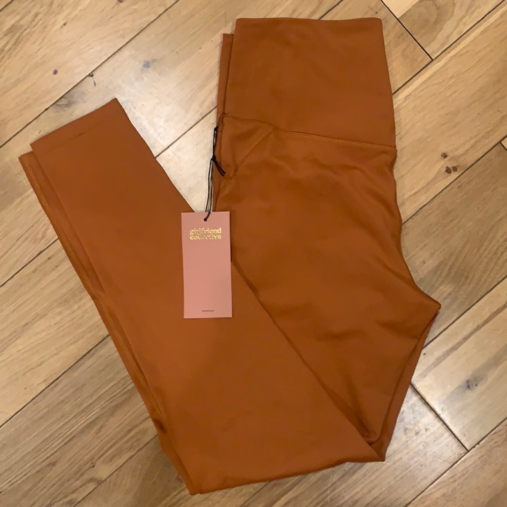 NWT Girlfriend Collective Orange/Gold high rise leggings. Size Large.